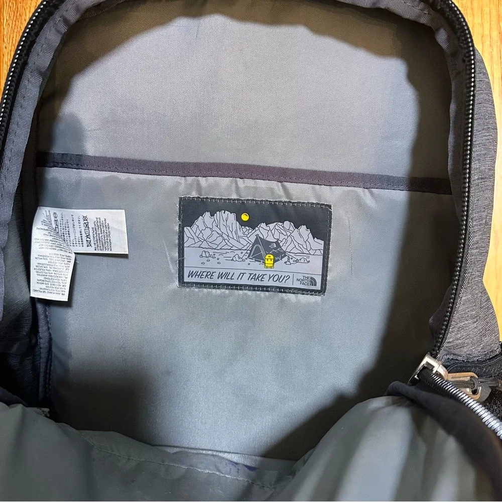 The North Face Jester Backpack  Everyday Travel Pack Black Gray Silver Hardware